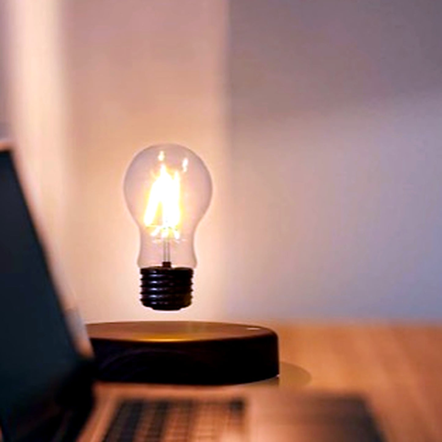 Jared's Floating Bulb Desk Lamp desk close-up