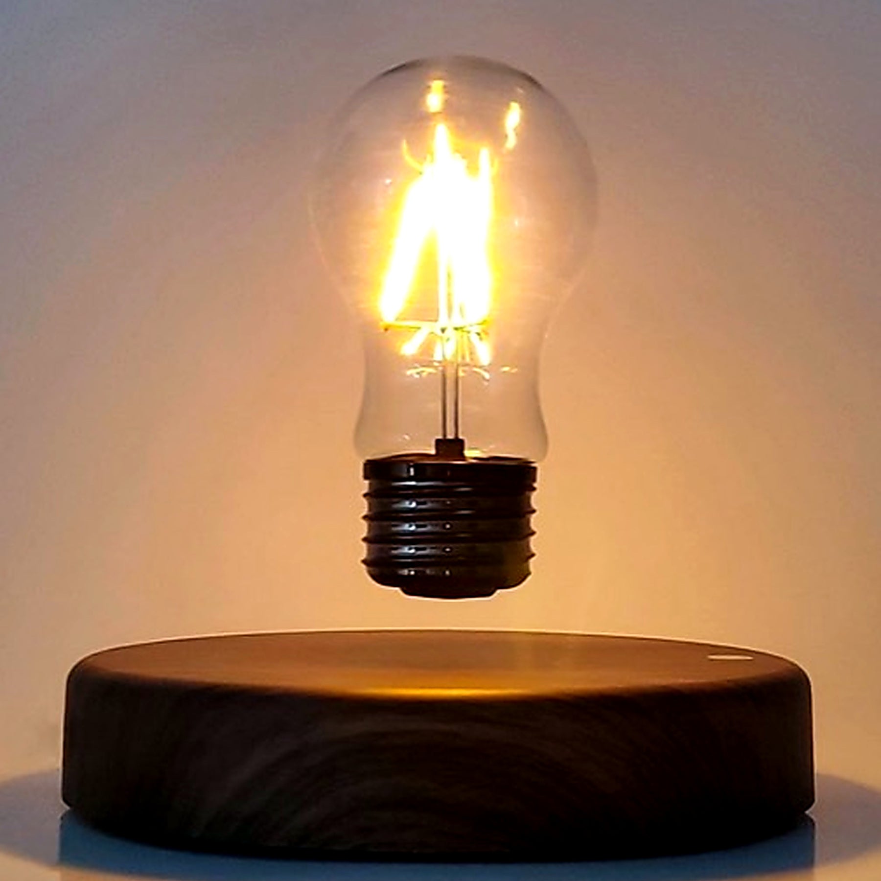 Front close-up of the glowing floating bulb